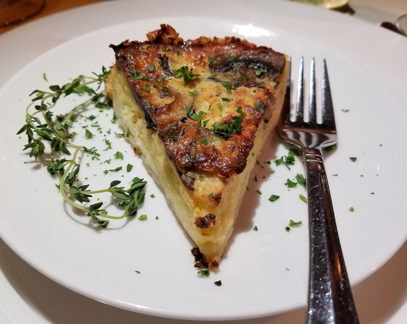 Chino whips up a variety of quiches at Bon Appetit. The mushroom and swiss is one of the best. BOB YESBEK PHOTOS